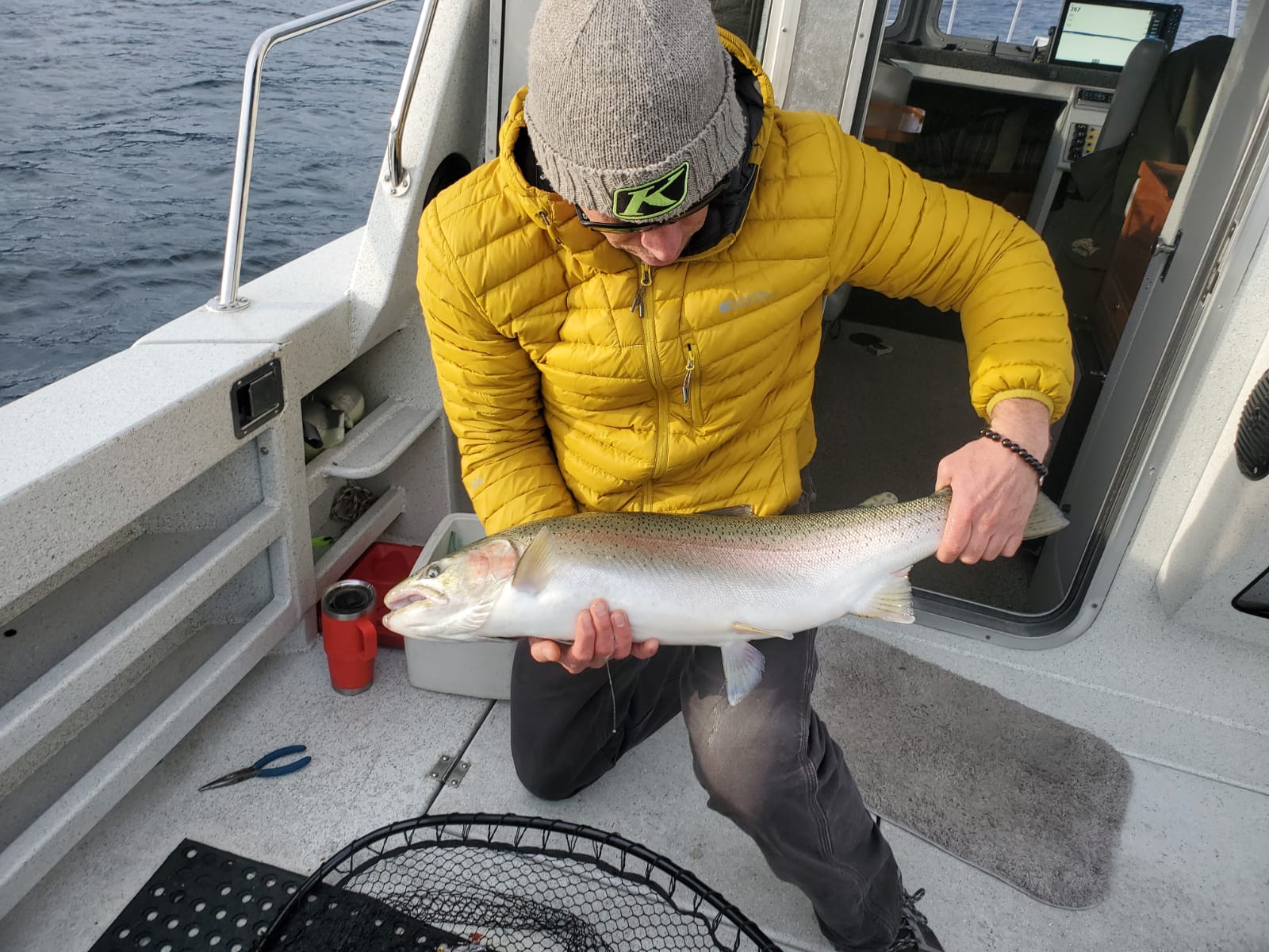 Action shot — guest with rainbow on the deck